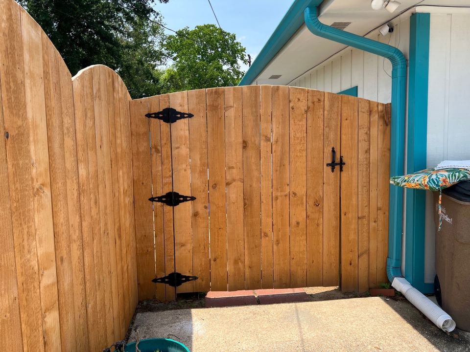Scalloped-Top Wood Privacy Fence