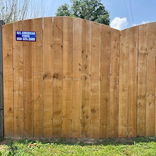 Scalloped-Top Wood Privacy Fence Installation 2