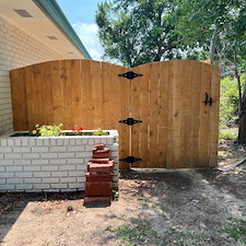 Scalloped-Top Wood Privacy Fence Installation 5